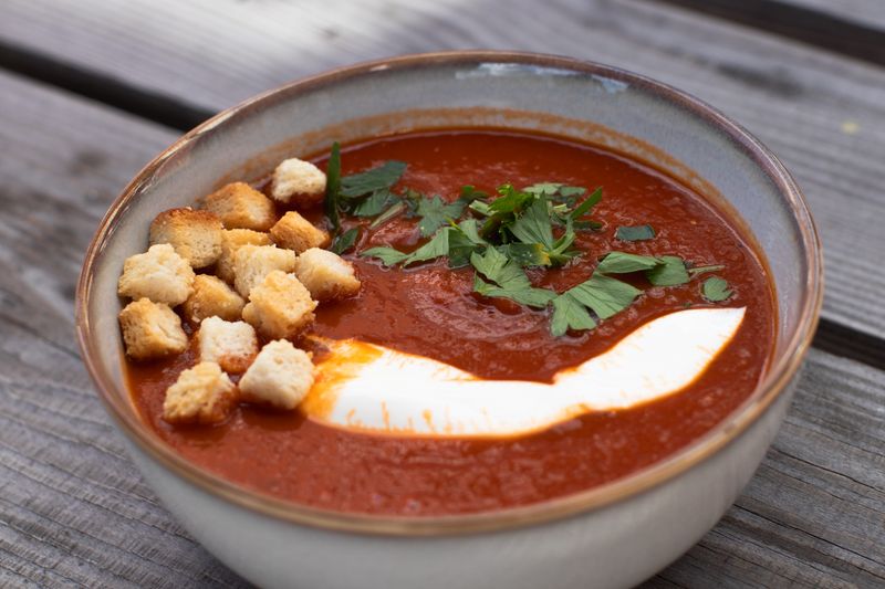 Creamy tomato basil soup with crusty bread