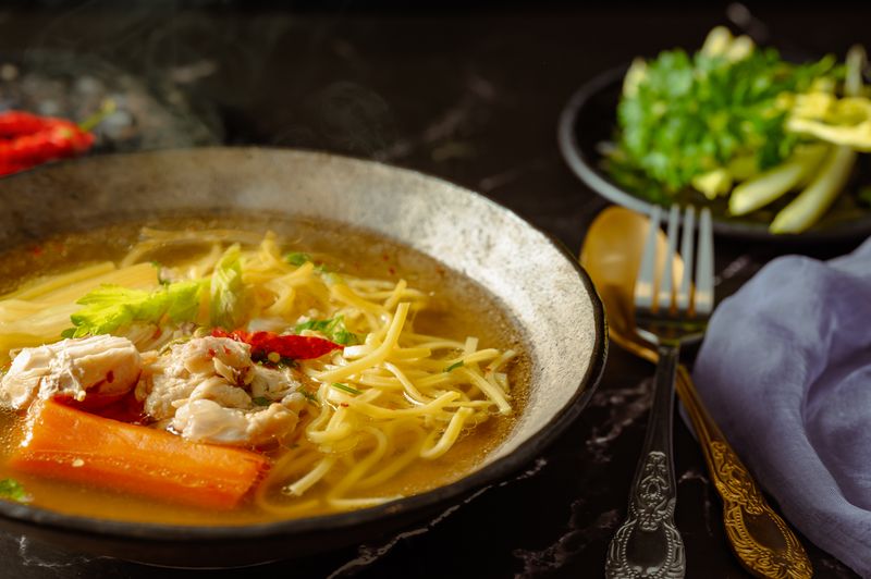 Chicken noodle soup with fresh vegetables